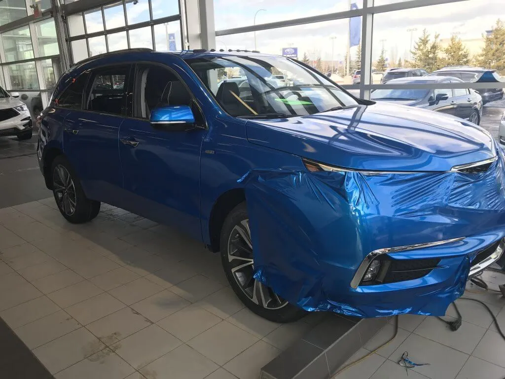 Full blue wrap on Acura MDX