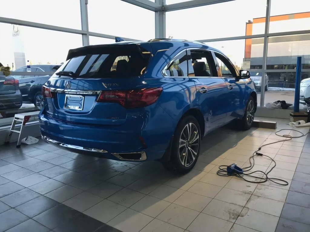 Full blue wrap on Acura MDX
